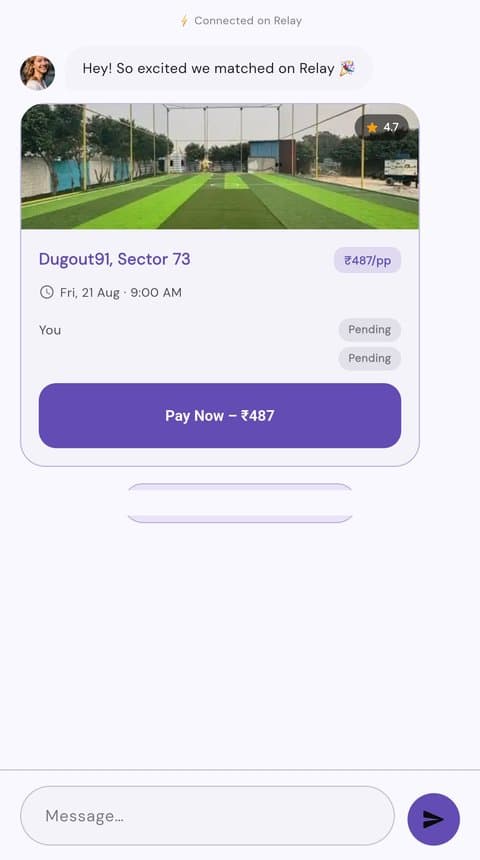 Chat screen with a shared venue booking card